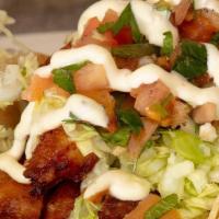 Baja Fish Taco · Breaded and fried fish topped with baja sauce, green cabbage and salsa fresca.