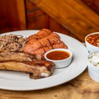 Byo Big Combo Plate · Your choice of three meats, two sides, and two drinks.