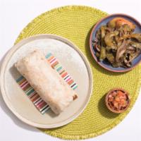 Fajita Veggie Burrito · Fajita peppers and onions, brown rice, refried beans, lettuce, guacamole, and pico de gallo ...