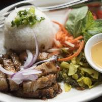 Spicy Pork Belly Rotisserie With Banh Hoi · Sautéed Carlton farms pork belly, lemongrass, chili, shrimp sauce, banh hoi (angel hair rice...