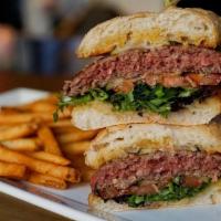 Beyond Burger · Plant based burger, toasted vegan bun, pickles & tomato