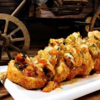 Vaquero Roll · Filled with beef, cucumber, avocado and cream cheese. Outside: ranchero style shrimp, cheese...