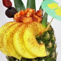 Pina Loca · Pineapple, jicama, cucumber, watermelon, mango, peanut, rielito, chamoy & tajin.