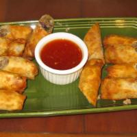 Lumpia · Six wonton wrappers stuffed with beef, pork, cabbage, green onions, and carrot deep fried an...