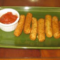 Mozzarella Stick · Eight breaded mozzarella cheese sticks deep-fried until golden brown and served with marinar...