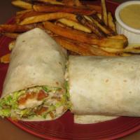 Caesar Chicken Wrap · Breaded or grilled chicken breast, romaine lettuce, Parmesan cheese, croutons and bacon wrap...