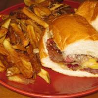 Philly Cheese Steak · Thinly sliced smoked new york roast, grilled onions and bells peppers with smoked gouda chee...