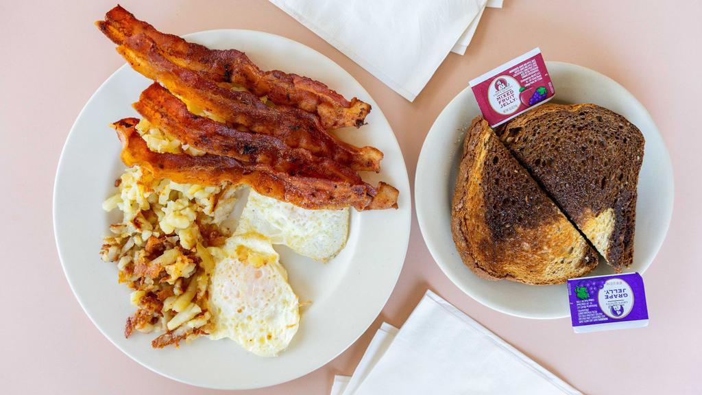 Ham, Bacon, Or Sausage & Eggs · Choice of meat served with two eggs, hashbrowns, and toast.