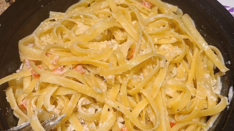 Fettuccine Alfredo · Creamy alfredo Sauce served over fettuccine Pasta. Add chicken for an additional charge.