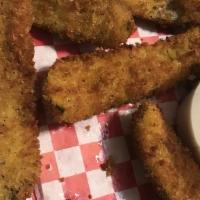 Mozzarella Sticks · House made sticks of mozzarella, lightly breaded and fried until the cheese is gooey and hot...