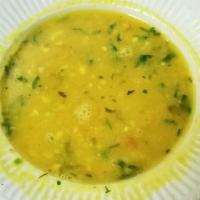 Dal Soup · Creamy yellow lentils, mixed with a delicate blend of spices.