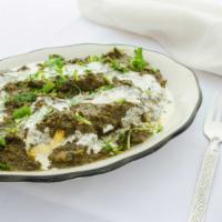 Saag Paneer · A classic Indian vegetable dish with cubes of homemade Indian cottage cheese cooked with spi...