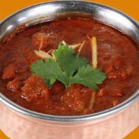 Lamb Vindaloo · Succulent lamb cubes cooked in a highly spiced garlic and hot pepper sauce with potatoes. Se...