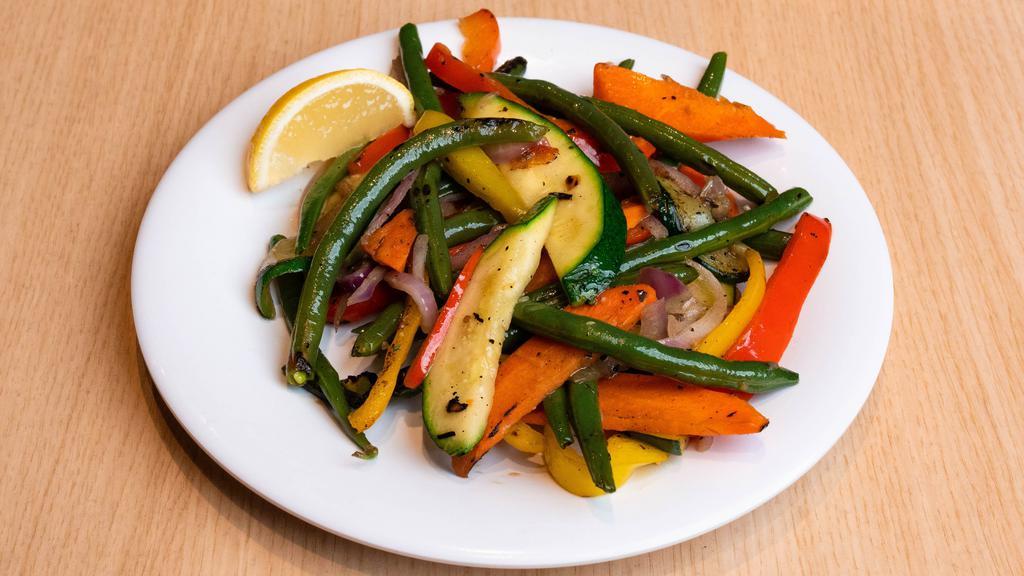 Vegetable Medley · A blend of Italian Squash, Red Onions, Carrots, Red and Yellow Bell Peppers, Green Beans, all Sauteed and Seasoned to perfection!