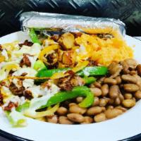 Alambre Plate · Mexican Dish - fajita style but with monster cheese, ASADA, CHICKEN and CHORIZO meats. rice ...