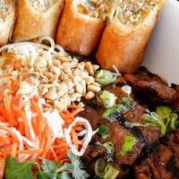 Special Vermicelli  · Vermicelli  noodles, char-grilled skewers of shrimp , pork , fried spring roll , peanut, pic...