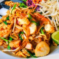 Pad Thai Seafood · Rice noodle stir-fried with fried tofu, egg, bean sprout and pad thai sauce, garnished with ...