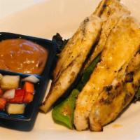 Chicken Satay · Four pieces. Chicken marinated in curry powder on skewers grilled. Served with peanut sauce ...