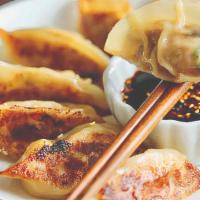 Pot Stickers · Six  pieces. Fried pork and vegetable pot sticker served with soy ponzu sauce.