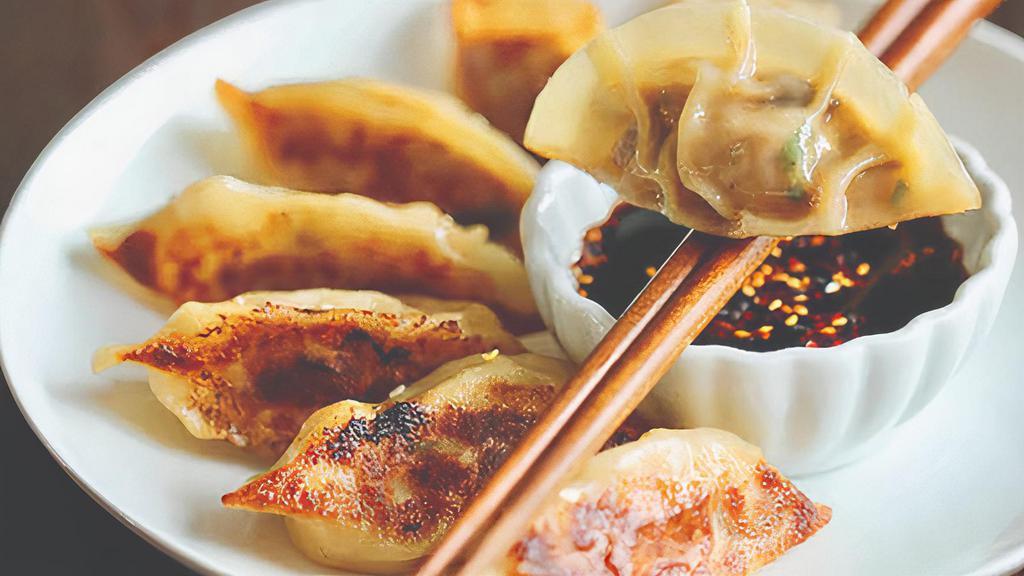 Pot Stickers · Six  pieces. Fried pork and vegetable pot sticker served with soy ponzu sauce.