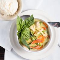Green Curry · Spicy. Spicy green curry with bamboo shoots, bell peppers, onions and jalapeños. Served with...