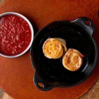 Rotoli Qty 2 · Fired Pie Rolls with choice of sauce