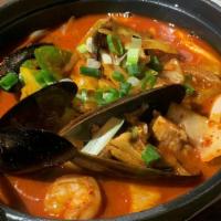 Spicy Champong Nabe · Seafood and pork with mixed veggies, udon noodles made spicy with a smoky flavor.