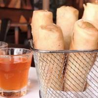 Egg Roll (Spring Roll) (4 Pcs) (V/Veg) · Deep-fried spring rolls. Marinated in black pepper and light soy sauce. Mixed with cabbage a...