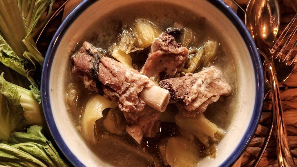 Pickled Cabbage With Spare Ribs Soup (Gf) · Sour soup flavored with pickled cabbage and pork spare ribs.