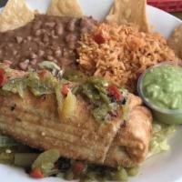 Chimichanga · Served with rice, beans, guacamole, and sour cream.