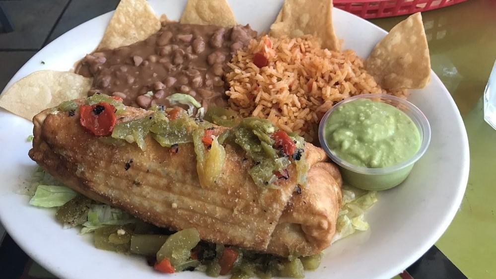 Chimichanga · Served with rice, beans, guacamole, and sour cream.