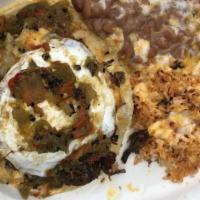 Frank'S Enchilada Plate · Three thick hand made tortillas, lettuce and tomato, garnish with egg and two sopapillas, be...