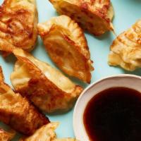 Chicken Dumplings (5) · Chicken and vegetable, choice of steamed or pan fried.