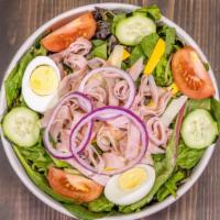 Chef Salad · American and Swiss cheese, Black Forest ham, smoked turkey. With tomatoes onions, cucumber a...