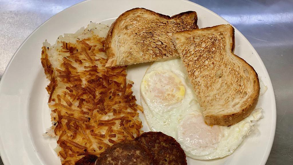 Two Egg Breakfast · Two eggs, choice of bacon or veggie sausage, hashbrowns & toast