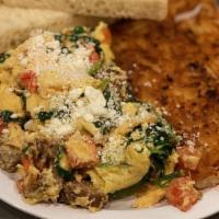 Downtown Scramble  · Tomatoes, spinach, roasted garlic & bacon OR veggie sausage, scrambled with three eggs & top...