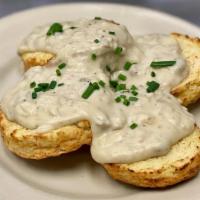 Biscuit & Gravy · Vegetarian. Two housemade biscuits split open and topped with our house vegetarian sausage g...