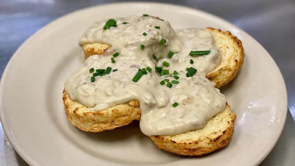 Biscuit & Gravy · Vegetarian. Two housemade biscuits split open and topped with our house vegetarian sausage gravy.