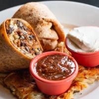 Tommy'S Wrap · Three eggs* scrambled with hashbrowns, pulled pork or smoked tempeh chorizo, pepperjack chee...