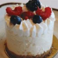 Raspberry Cheesecake · Contains: dairy, eggs, whole wheat (gluten). Baked cheesecake topped with raspberry jam and ...
