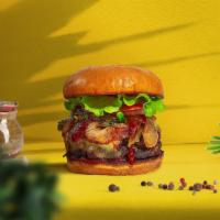 Bbq Blaze Vegan Burger · Plant-based impossible patty grilled and topped with vegan cheddar cheese, barbecue sauce, c...