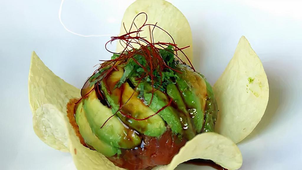 Spicy Tuna Tartar · Spicy. Tuna wrapped in avocados served with eel sauce and crisps. Spicy.