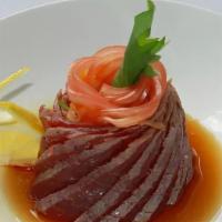 Tuna Tataki · Slightly seared big eye tuna served with ponzu sauce.