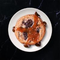 The Fire Cookie · A true treat- a chocolate chip cookie & fudge brownie all in one, drizzled with sea salt & c...