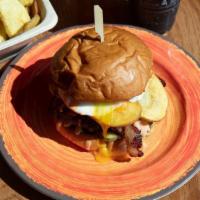 The Farmers Burger · Pickles, Potato Chips, Cheddar, Pork Belly, Bacon, Egg, Divine Sauce