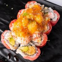Salmon Lover · Tempura shrimp, avocado, crunch, topped with salmon, spicy mayo.