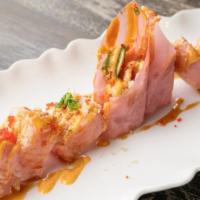 American · Tuna, salmon, escolar, yellowtail, avocado with rolled soy paper, topped with crunchy, spicy...