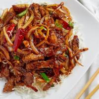 Mongolian Beef · *Spicy-Tender sliced beef, green and yellow onion stir fried with spicy sauce