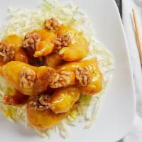 Honey Walnuts Prawn · Crispy battered prawns in a sweet creamy sauce with walnuts over top
