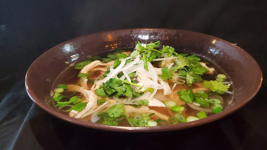 Chicken Pho Soup · Chicken Breast and in-house broth made from bones and meats with ginger, onions, various spices. Serve with rice noodles, cilantro, green onion, onion and jalapeno, bean sprout, basil, lime on the side.  Hoisin and sriracha sauces included.